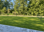 Garten (KI-generiert) - Ihr neues Zuhause: Exklusive 3-Zimmer-Neubauwohnung zum Erstbezug mit Gartenanteil