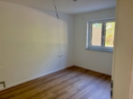 Schlafzimmer 1 - Ihr neues Zuhause: Exklusive 3-Zimmer-Neubauwohnung zum Erstbezug mit Gartenanteil