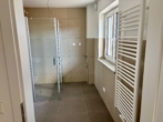 Badezimmer - Ihr neues Zuhause: Exklusive 3-Zimmer-Neubauwohnung zum Erstbezug mit Gartenanteil