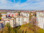Luftbild - Modern renovierte 2 -Zimmer-Wohnung mit Südbalkon, moderner Einbauküche und Tiefgarage !!!