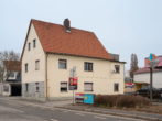 Ansicht Haus/Einfahrt - + Über 6% Rendite. Gepflegtes MFH und Autohandel komplett vermietet +