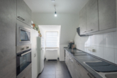 Küche - Helle 2-Zimmer-Wohnung mit West-Balkon und Tiefgaragenstellplatz