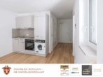 Titelbild - Zentrale 2-Zimmer-Neubauwohnung mit Terrasse und Gartenanteil!
