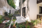 Terasse - Zentrale 2-Zimmer-Neubauwohnung mit Terrasse und Gartenanteil!