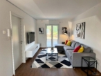 Wohnbereich - (KI generiert) - TOP moderne 2-Zimmer EG Wohnung mir ca. 94 m² Privatgarten!! - Küche inklusive