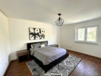 Schlafzimmer - (KI generiert) - TOP moderne 2-Zimmer EG Wohnung mir ca. 94 m² Privatgarten!! - Küche inklusive