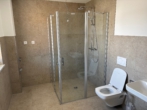 Badezimmer - Ihr neues Zuhause: Exklusive 3-Zimmer-Neubauwohnung zum Erstbezug mit Gartenanteil