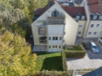 Außenansicht - Modernisiertes Wohnglück mit großzügigem Privatgarten – attraktive 3-Zimmer-Wohnung