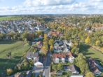 Außenansicht - Modernisiertes Wohnglück mit großzügigem Privatgarten – attraktive 3-Zimmer-Wohnung