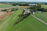 Außenansicht - *** Weitläufiges Anwesen mit vier Wohneinheiten, Werkstatthalle und Renditepotenzial ***